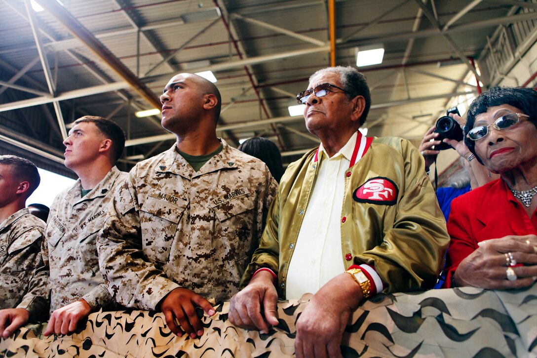Marines, sailors and families listen to President Barack Obama during his visit on Marine Corps Base Camp Pendleton, Calif., Aug. 7, 2013. Obama praised the troops and referred to their families as the "force behind the force." 