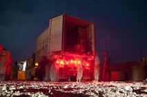 Marines with Combat Logistics Regiment 2, Regional Command (Southwest), close a mobile Post Exchange at a forward operating base in Helmand province, Afghanistan, Aug. 4, 2013. The mobile Post Exchange offered access various hygiene, uniform and food commodities rarely seen by servicemembers operating at the isolated base. 