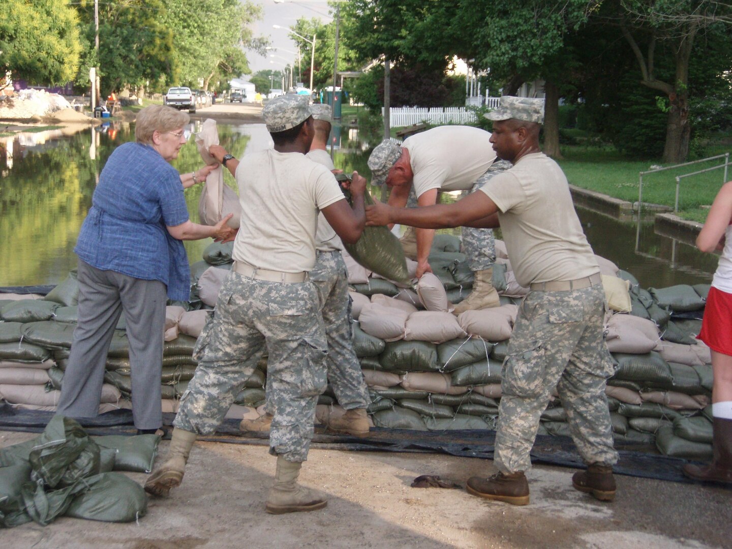 Missouri National Guard members, shown in 2008 sandbagging along the Mississippi River in Clarksville, Mo., more recently helped clear backlogged assistance cases.