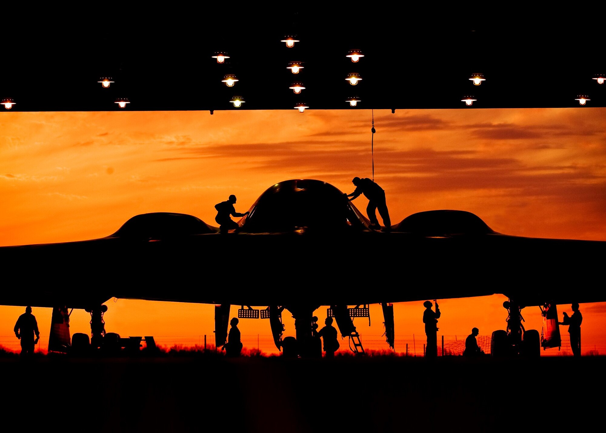 During early morning operations, 131st Bomb Wing Missouri Air National Guard mantainers service a B-2 Stealth at Whiteman Air Force Base, Mo. The 131st  BW has recently been certified to conduct nuclear missions upon completion of their initial nuclear surety inspection. 