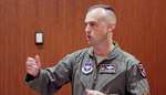 U.S. Air Force Col. Edward Vaughan, co-founder of the Guard and Reserve Network, or GARNET, speaks to the judges Jan. 23, 2013 in a series of 60-second "elevator pitches."