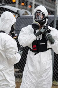 Georgia National Guard members suited up to approach the radiological source and enter the building during a recent drill.