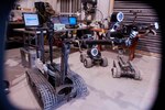 A robot's-eye view of other robots waiting to be checked out by technicians in the Joint Robotics Repair Detachment's shop Oct. 27, 2011.