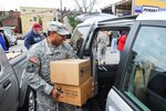 Staff Sgt. Jeffrey Hayes takes part in the Partners in Care program at a Baltimore church Nov. 19,2012.