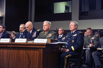 Army Gen. Frank Grass, the chief of the National Guard Bureau, right, testifies to the Senate Armed Services Committee on the impact on the Defense Department of sequestration and a yearlong continuing resolution at the Dirksen Senate Office Building in Washington, D.C., on Feb. 12, 2013.