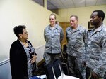 Stacia Robinson discusses networking with U.S. Air Force Brig. Gen Jocelyn Seng of Washington, D.C., Chief Master Sgt. Carl Collins of Florence, Ala., and Chief Master Sgt. Lawrence Kirby, of Philadelphia.
