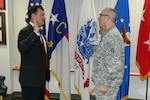 North Carolina state Sen. Dan Soucek is sworn into the North Carolina National Guard by Army Maj. Gen. Greg Lusk, adjutant general of North Carolina, Feb. 13, 2013.
