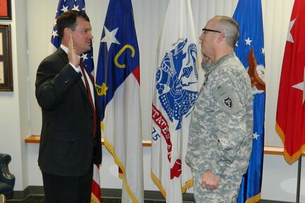 North Carolina state Sen. Dan Soucek is sworn into the North Carolina National Guard by Army Maj. Gen. Greg Lusk, adjutant general of North Carolina, Feb. 13, 2013.