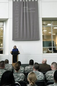 Holly Petraeus, head of the Consumer Financial Protection Bureau's Office of Service Member Affairs, speaks at the kick-off event for Military Saves Week at the Army National Guard Readiness Center in Arlington, Va., Feb. 19, 2013