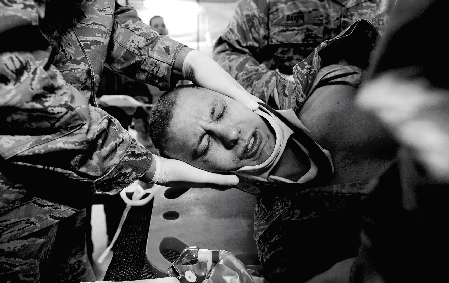 A medical technician with the 121st Medical Group prepares a simulated patient to be intubated in order to restore her airway as part of a training scenario at Suwon Air Base, Republic of Korea, Feb. 19, 2013.