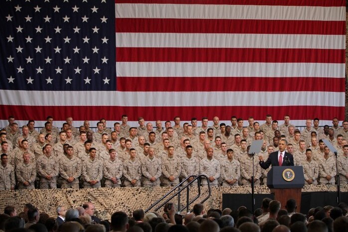 President Barack Obama speaks to a crowd of Marines, sailors and family members aboard Camp Pendleton, Aug. 7, 2013. President Obama visited the base to thank the Marines and sailors for their commitment to the mission in Iraq and Afghanistan and commended 1st Marine Division for being the most ready when the nation is least ready.