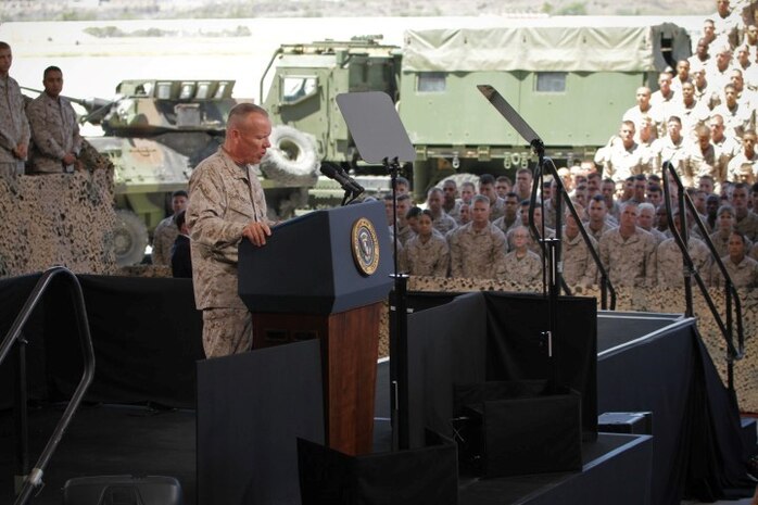 Major Gen. Lawrence D. Nicholson, the commanding general of 1st Marine Division, introduces President Barack Obama to a crowd of Marines, sailors and family members at the air station aboard Camp Pendleton, Aug. 7, 2013. President Obama visited the base to thank the service members for their commitment to the mission in Iraq and Afghanistan, and to deliver encouragement to the future of the Marine Corps.