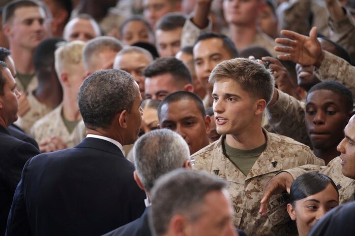 President Barack Obama shakes hands with Cpl. Devin Zuccherino, a supply administration and operations specialist serving with 1st Supply Battalion, Combat Logistics Regiment 15, after delivering a speech here, Aug. 7, 2013, thanking the Marines of 1st Marine Expeditionary Force for their commitment to being the most ready when the nation is least ready. Among many of the topics President Obama talked about was his expectation of the Marine Corps as U.S. troops continue to transition out of Afghanistan - emphasizing their amphibious capabilities. Zuccherino is a native of Aurora, Colo.