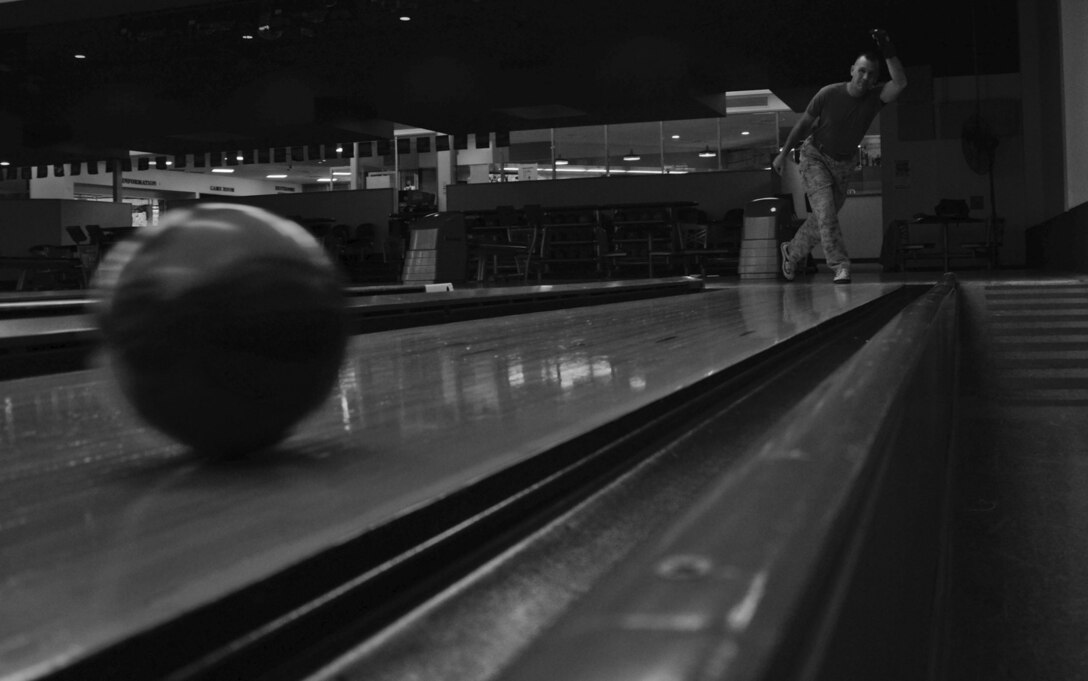 Master Gunnery Sgt. Mark Gleason, bandmaster, U.S. Marine Corps Forces, Pacific Band, recently bowled his first perfect game while playing with the Friends of K-Bay Mixed Handicap Bowling League, July 23, 2013. (U.S. Marine Corps photo by Kristen Wong)