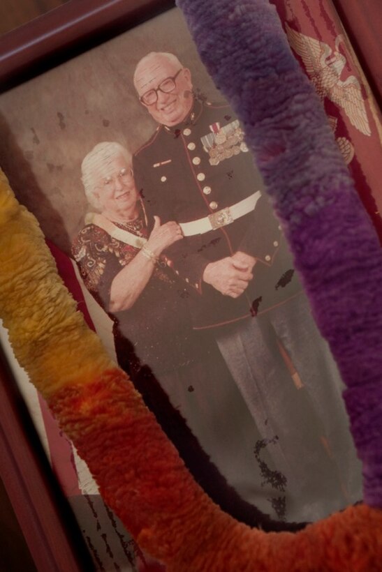 Photos were displayed of Flora and Robert Porter at the late retired sergeant major's funeral service, Aug. 2, 2013, at Hawaii State Veterans Cemetery in Kaneohe, Hawaii. The pair was married for 60 years. Porter served 30 years in the Marine Corps, which included service in World War II, Korea and two tours in Vietnam. (U.S. Marine Corps photo by Cpl. Sarah Dietz)