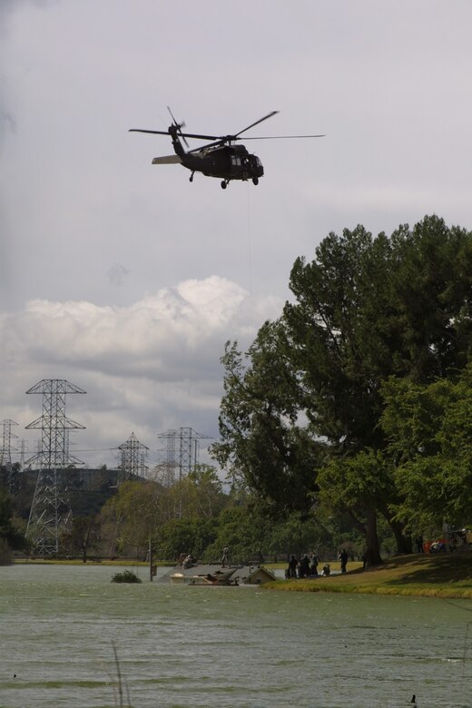 Upon issuing a film permit, another group of Corps professionals step in to ensure the environment is protected and facilities are not damaged during filming.  Most of all, they ensure filming is conducted in a safe manner. 
For example, in May, the U.S. Army National Guard released their newest commercial, which was filmed in the Corps’ Whittier Narrows flood control basin and incldued high risk maneuvers using a Blackhawk helicopter. 
