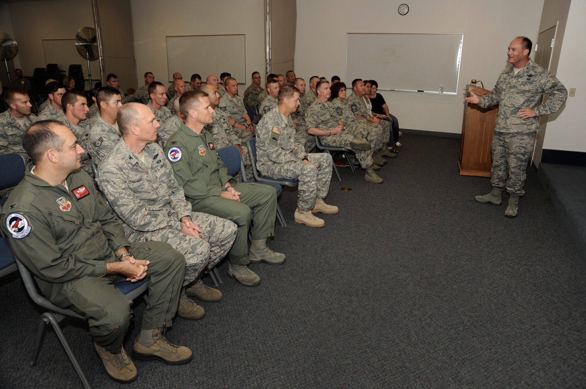 Oregon Brig. Gen. Michael Stencel, Oregon Assistant Adjutant General for Air, addresses leaders of the Oregon National Guard and the 142nd Fighter Wing 142nd Security Forces Squadron in attendance during the in processing for the 142nd SFS at the Portland Air National Guard Base, Ore., Aug. 9, 2013. (Air National Guard photo by Tech. Sgt. John Hughel, 142nd Fighter Wing Public Affairs/released)