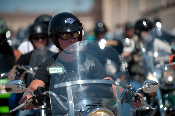 Paul Marcello, 28th Bomb Wing historian, revs his motorcycle with other participants during the 2013 Dakota Thunder Run on the flightline at Ellsworth Air Force Base, S.D., Aug. 6, 2013. More than 200 Airmen, family members and civilian motorcyclists participated in the 60-mile ride through the Black Hills and downtown Sturgis. (U.S. Air Force photo by Airman 1st Class Zachary Hada/Released)
