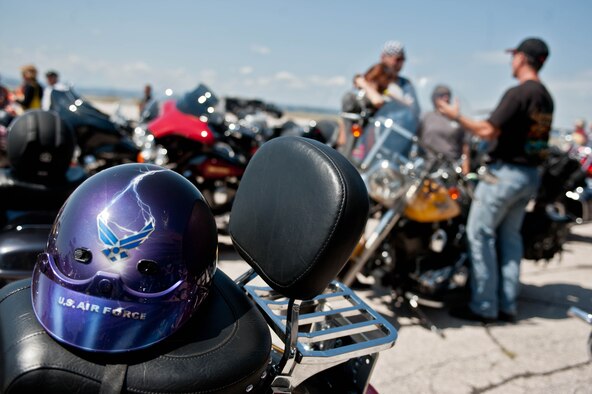 A custom U.S. Air Force helmet rests on a motorcycle during the 2013 Dakota Thunder Run on the flightline at Ellsworth Air Force Base, S.D., Aug. 6, 2013.The run is intended to honor military members and veterans, and culminates with a military appreciation event each year where a local veteran is recognized for their service. (U.S. Air Force photo by Airman 1st Class Zachary Hada/Released)