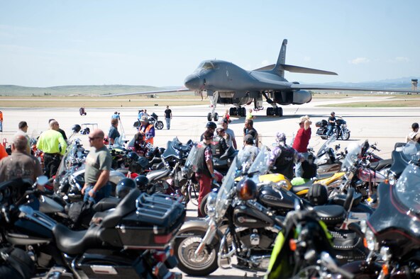A B-1 bomber sits out on the flightline during the 2013 Dakota Thunder Run at Ellsworth Air Force Base, S.D., Aug. 6, 2013. The event, hosted by Ellsworth's Green Knights Dakota Thunder Motorcycle Club, began on the flightline after those present had the opportunity to tour and photograph B-1 static displays. (U.S. Air Force photo by Airman 1st Class Zachary Hada/Released)