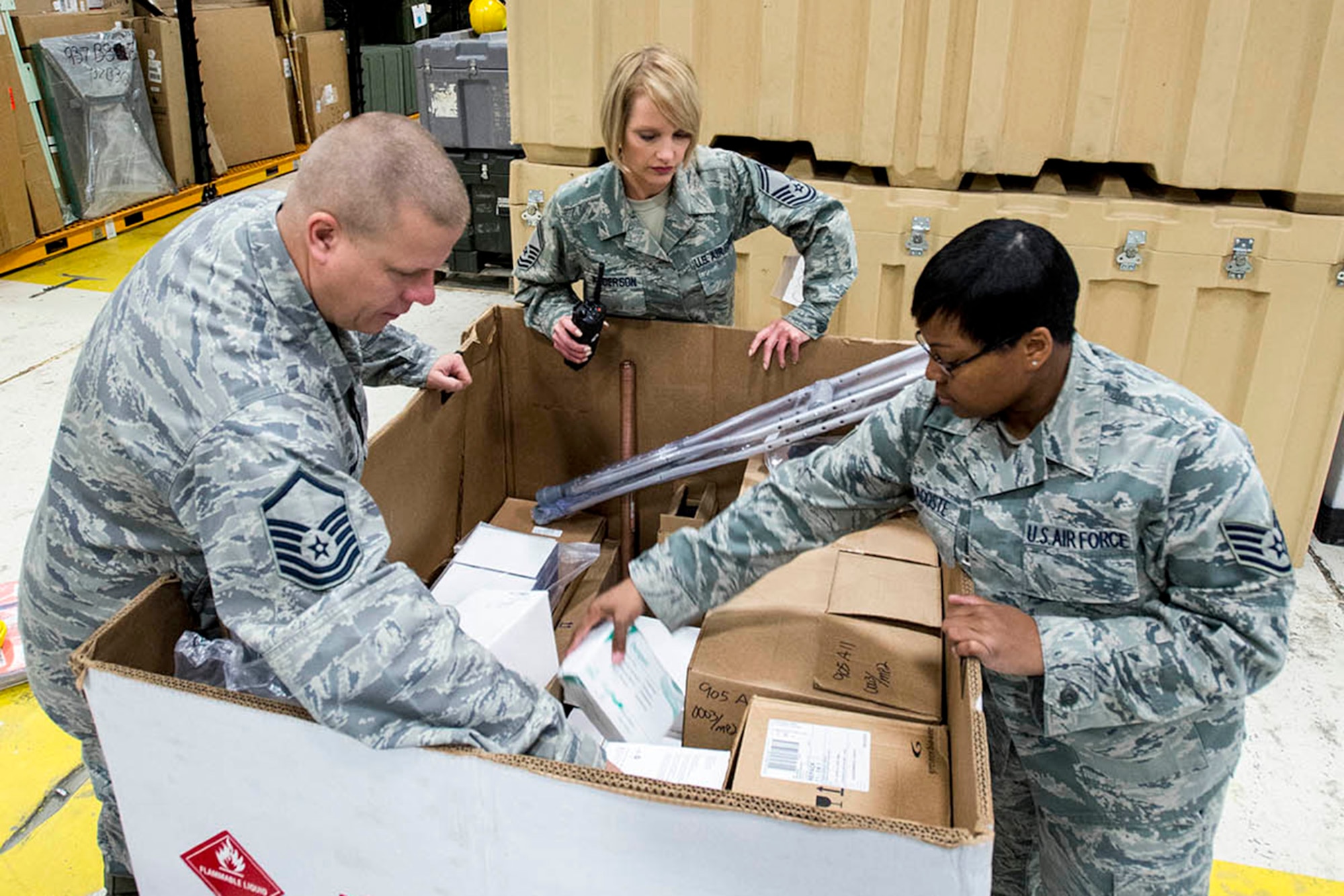 Senior Master Sgt. Michelle Anderson (center), 446th Aeromedical Staging Squadron, Medical Readiness Flight superintendent, out of McChord Field, Wash., and Airmen from Fairchild Air Force Base, Wash., inventory medical supplies, Aug. 2, 2013. When she isn’t fulfilling her Reserve duties, Anderson operates her professional soft-skills training company, Star Services NW. (U.S. Air National Guard photo by Master Sgt. Michael Stewart)