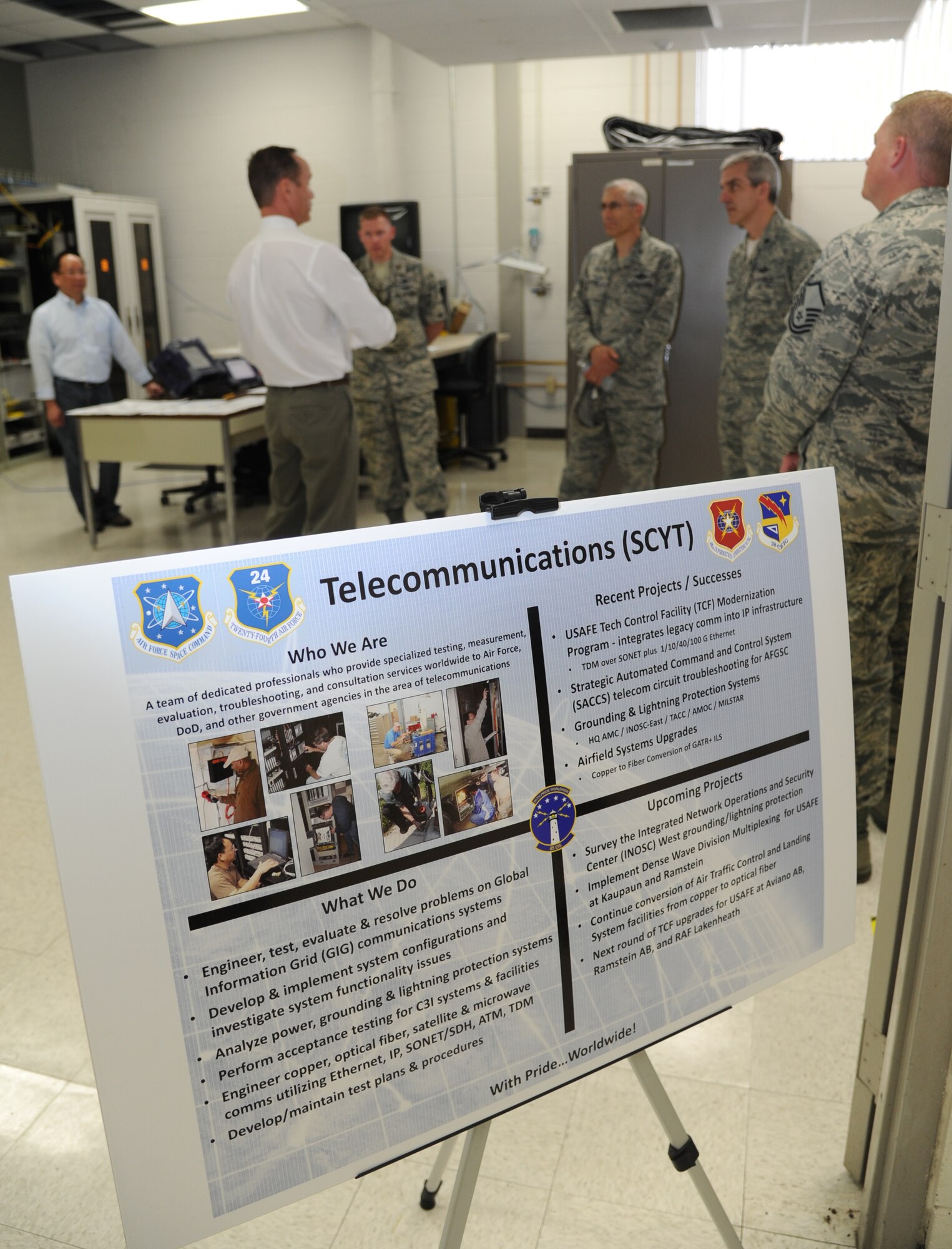 Peter Bui and Kent Massey, 85th Engineering Installation Squadron telecommunications engineers, brief 81st Training Wing leadership on telecommunications engineering during an 81st TRW leadership tour of the 85th EIS Aug. 8, 2013, at Maltby Hall, Keesler Air Force Base, Miss.  The purpose of the tour was to educate leadership on the unique services and day-to-day operations of the Air Force’s only active duty engineering installation squadron.  (U.S. Air Force photo by Kemberly Groue)
