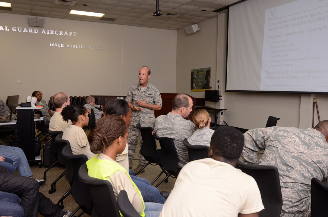 Lt. Col. George Pelech, 94th Airlift Wing chief of safety, conducts Wingman Day 2013 at the Finch Building, Dobbins Air Reserve Base, Ga. Aug. 4. Airmen took a pause from day-to-day mission duties and focused on unit wellness and getting to know each other a little better. (U.S. Air Force photo/Don Peek)