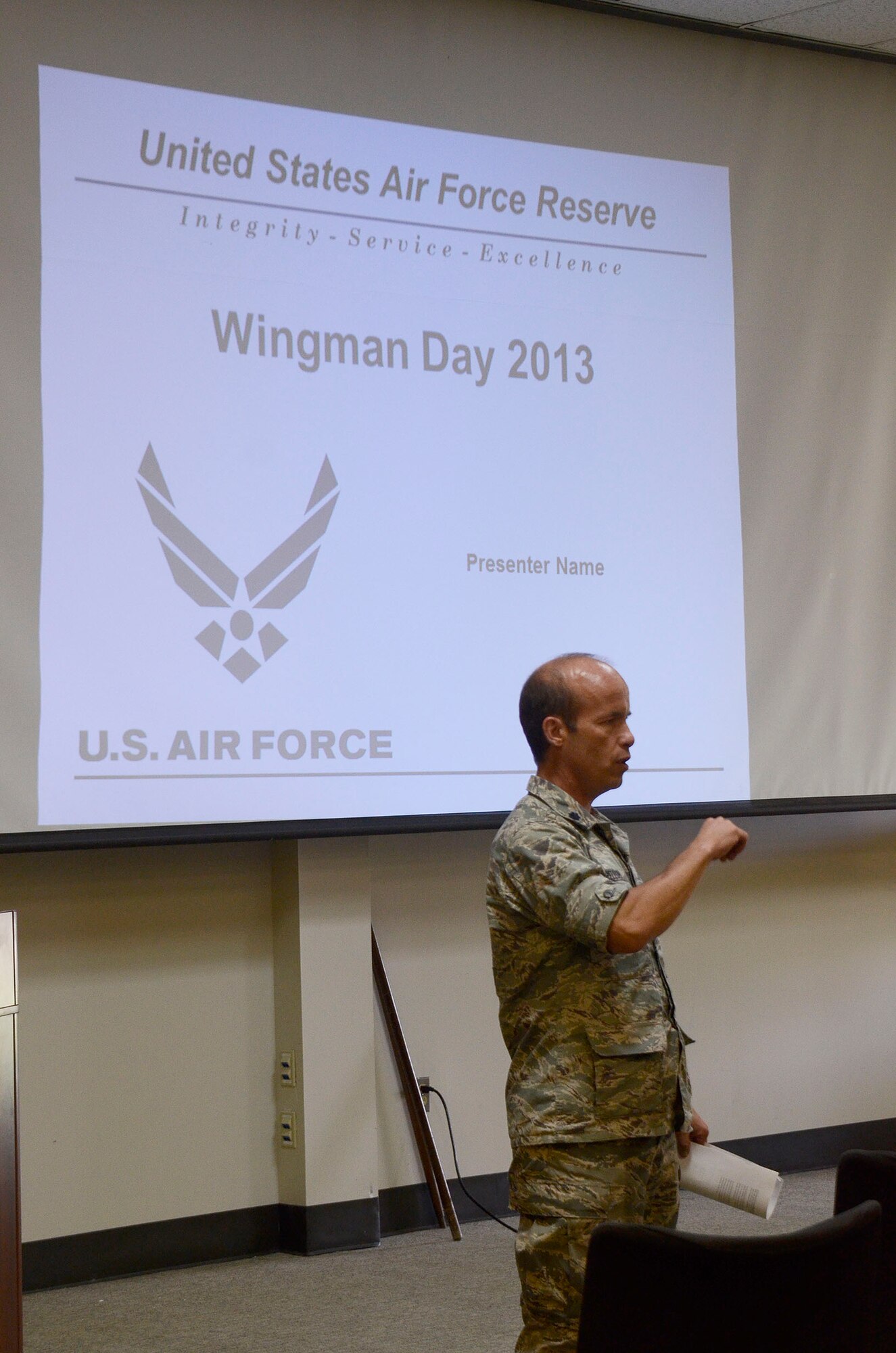 Lt. Col. George Pelech, 94th Airlift Wing chief of safety, conducts Wingman Day 2013 in the Finch Building, Dobbins Air Reserve Base, Aug. 4. Airmen took a pause from day-to-day mission duties and focused on unit wellness and getting to know each other a little better. (U.S. Air Force photo/Don Peek)