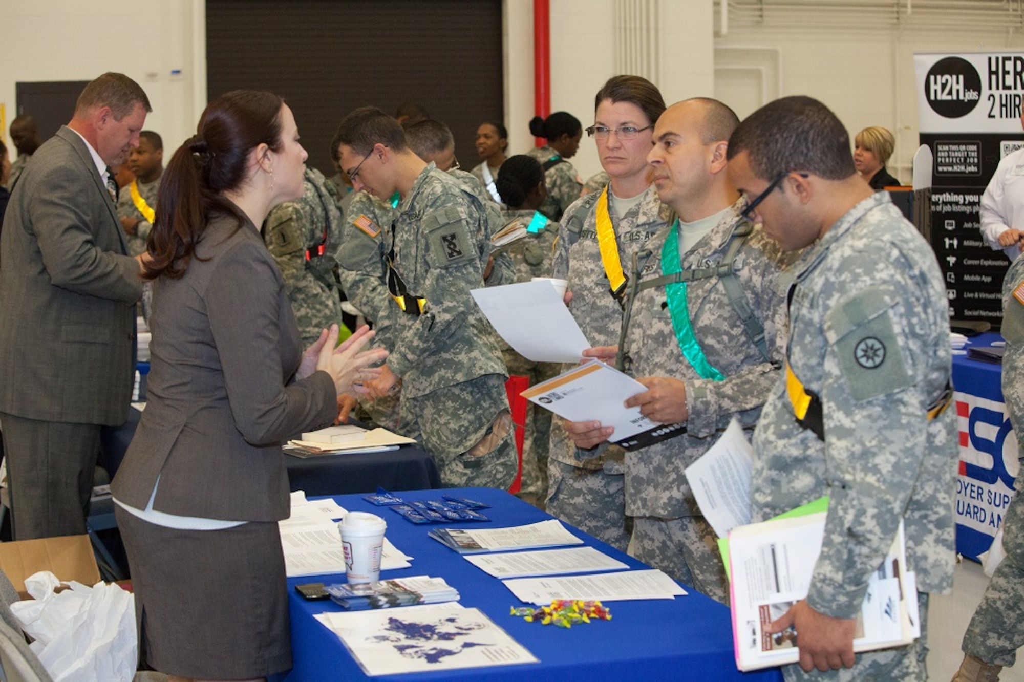 The 77th Sustainment Brigade in partnership with Hero 2 Hired and Employer Support of the Guard and Reserve host a Veterans Career Expo as part of Operation Sustainment Warrior, an annual training exercise for the Army Reserve Soldiers, Aug. 5, 2013, at Joint Base McGuire-Dix-Lakehurst, N.J. The brigade members also attended briefs on the GI Bill, transition from military to civilian interviews, resume writing and networking. (U.S. Air Force photo by Wayne Russell/Released)