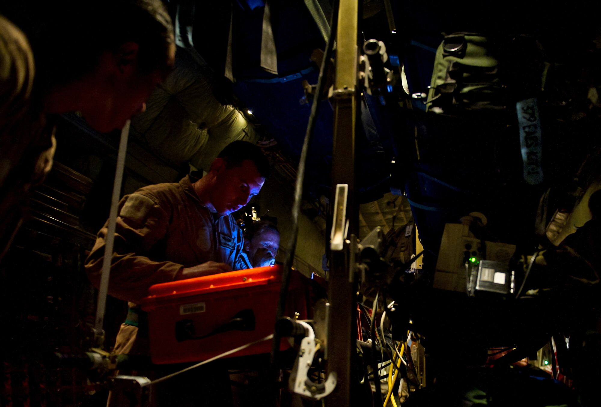 U.S. Air Force Senior Airman Christopher Rowland, 379th Expeditionary Aeromedical Evacuation Squadron medical technician, checks medical equipment on a C-130 Hercules before an aeromedical evacuation mission, July 19, 2013, at an undisclosed location in Southwest Asia. The EAES teams are needed to transport patients to medical facilities from remote deployed locations for additional treatment. Rowland, a native of Jacksonville, Fla., is deployed from the 18th Aeromedical Evacuation Squadron, Kadena Air Base, Okianwa, Japan. (U.S. Air Force photo/Staff Sgt. Marleah Miller)