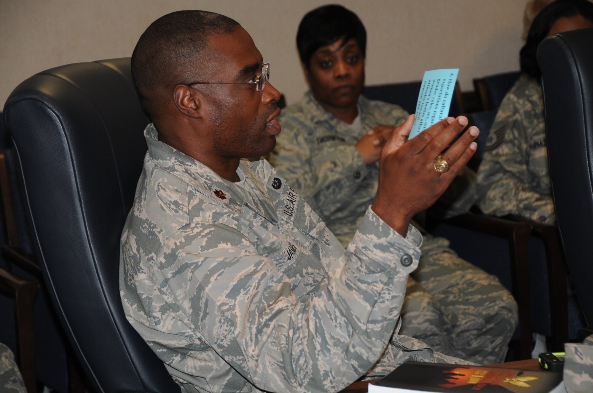 Maj. Chidi I. James, 192nd Fighter Wing Judge Advocate General, gives a response to a discussion question during a group session for the Sexual Assault Prevention & Response Stand-Down Program, August 11, 2013. The SAPR Program is designed to address sexual assault in the military and provides tools and resources for service members to use if an incident occurs. (U.S. Air National Guard photo by Airman 1st Class Johnisa B. Roberts/Released)