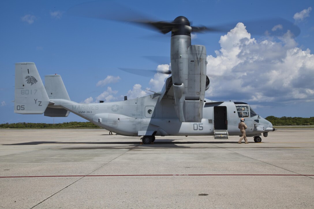 An MV-22B Osprey taxis after landing at Marine Corps Air Station Futenma Aug. 12. The Marine Corps is modernizing its fleet with MV-22 tiltrotor aircraft and removing the remaining CH-46E helicopters from service with one-for-one swaps. The Ospreys can fly twice as fast, carry three times as much and fly four times the distance of the older CH-46E helicopter it is replacing. The Ospreys are with Marine Medium Helicopter Squadron 262, Marine Aircraft Group 36, 1st Marine Aircraft Wing, III Marine Expeditionary Force. (U.S. Marine Corps photo by Lance Cpl. Stephen Himes)