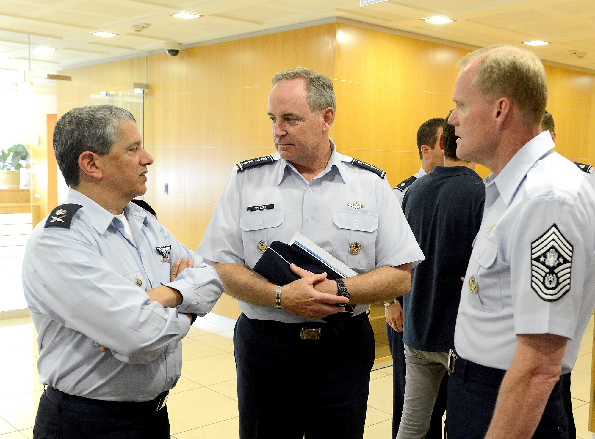 Chief of Staff Gen. Mark A. Welsh III (center), and Chief Master 
Sgt. of the Air Force James A. Cody (right), speak with Maj. Gen. Amir Eshel, the commander of the Israeli Air Force Tel Aviv, Aug. 4, 2013. Welsh's visit provided the opportunity to discuss the future of the U.S.-Israel military partnership, and included a number of office calls and site visits with Israeli senior military leaders, along with a cultural tour.  

