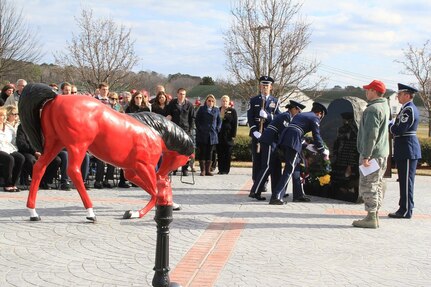 The Virginia Air National Guard's Virginia Beach-based 203rd RED HORSE Squadron holds a memorial service March 3, 2013, at Camp Pendleton to honor 18 unit members and three Florida Army Guard aviators who perished when the C-23 Sherpa they were flying in crashed in a cotton field near Unadilla, Ga., 12 years ago.