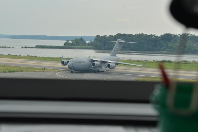 A C-17 Globemaster III cargo airplane taxis into loading position at Marine Corps Air Facility Quantico on July 31, 2013. C-17’s can haul more than 170 tons of freight and often transport vehicles and personnel for the President of the United States anywhere in the world.
