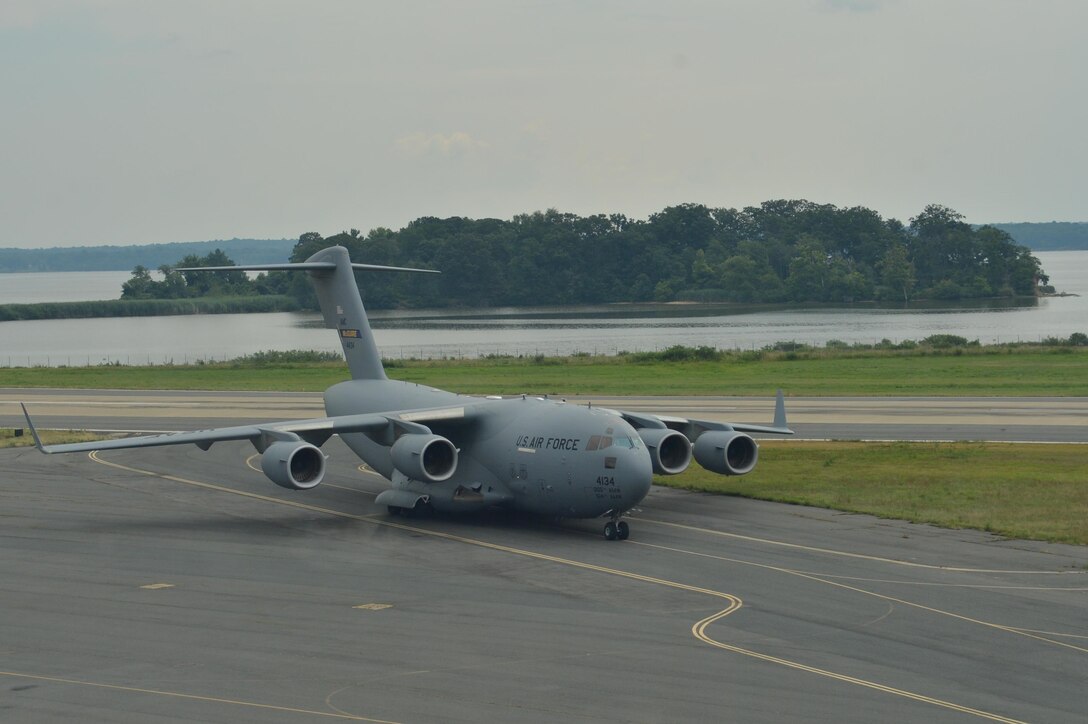 A C-17 Globemaster III cargo airplane taxis into loading position at Marine Corps Air Facility Quantico on July 31, 2013. C-17’s can haul more than 170 tons of freight and often transport vehicles and personnel for the President of the United States anywhere in the world.