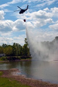 The Tennessee Army National Guard is assisting firefighting efforts with two Blackhawk UH-60 helicopters and Bambi buckets.