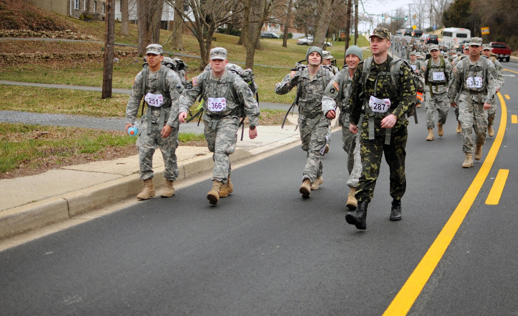 Service members march 18.6 miles to give back to community > National