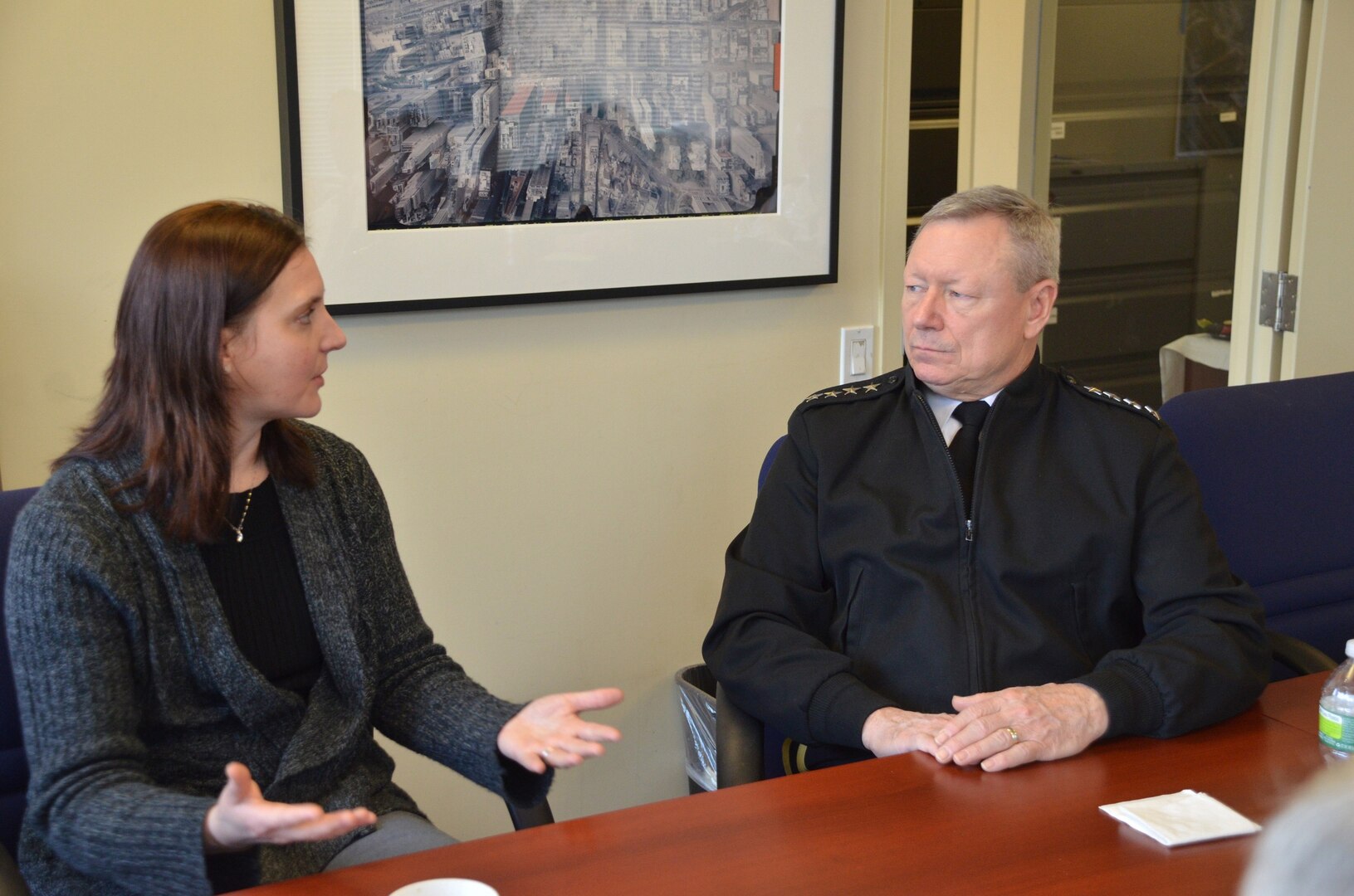 Gen. Frank Grass, chief of the National Guard Bureau, speaks with Jennifer Adams, CEO of the WTC Tribute Center, about including the story of the National Guard's response to the Sept. 11, 2001, attacks during a visit here on March 15.