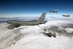 Capt. Jared White, an F-16 Fighting Falcon pilot from the 421st Fighter Squadron, Hill Air Force Base, Utah, maneuvers into position to receive fuel from a Utah National Guard KC-135 tanker enroute to San Diego, Calif., Jan. 18, 2013.