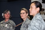 Lt. Col. Tammy Gross, Maj. Lan Swei and Master Sgt. Deborah Severson spoke about their perspectives and experiences as women in the military during a Women's History Month observance March 21, 2013, in Joint Force Headquarters, Madison, Wis.