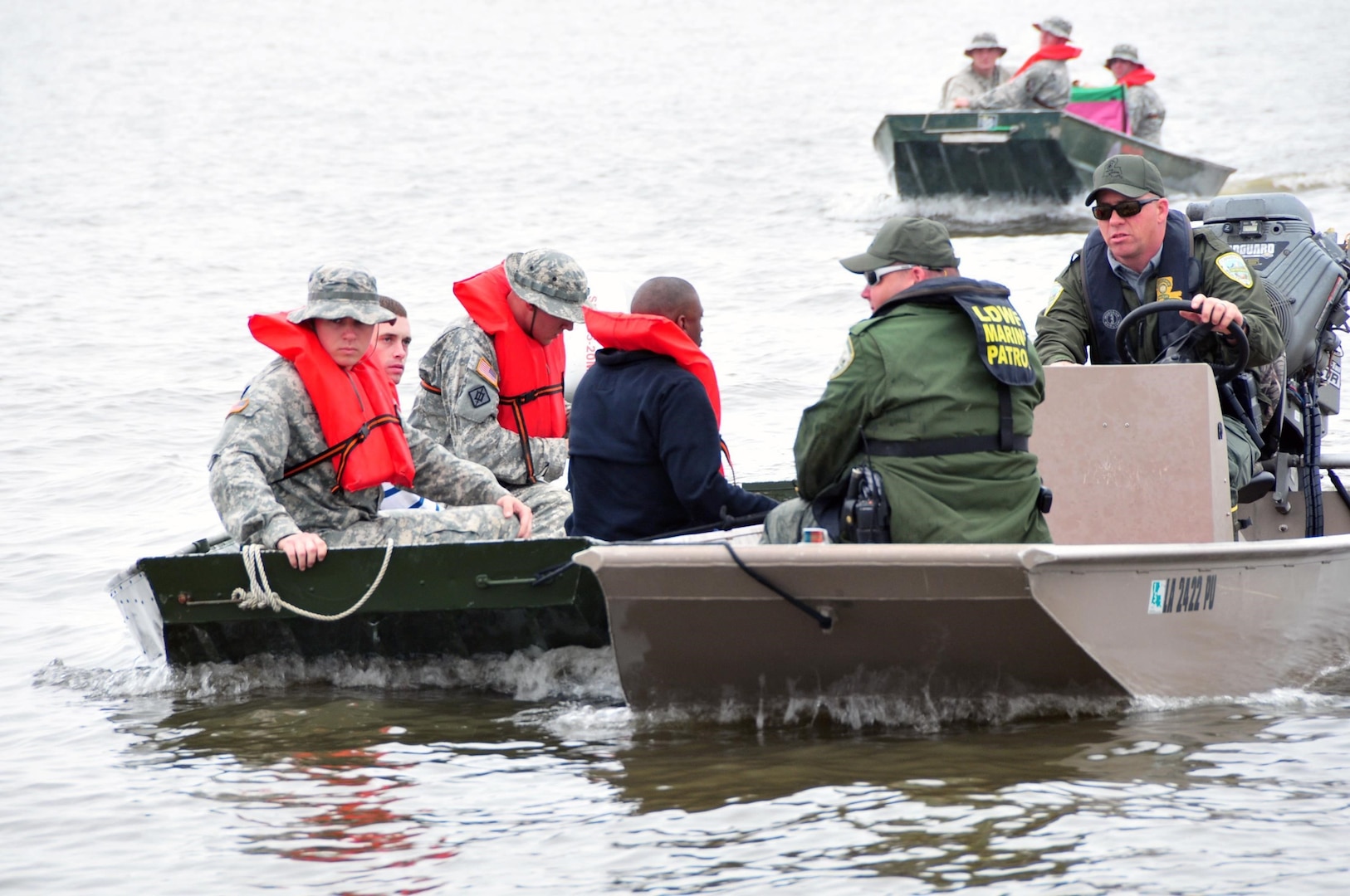 Members of the Louisiana National Guard's 225th Engineer Brigade conduct a search and rescue exercise during a March 23, 2013, disaster response drill at Fontainebleau State Park, Mandeville, La.