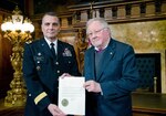 Maj. Gen. Randall Marchi, Pennsylvania deputy adjutant general-Army, on behalf of Pennsylvania Gov. Tom Corbett, recognized Vytautas Landsbergis with a proclamation.
