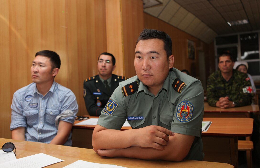 Military medical professionals from Canada, Republic of Korea and the U.S. join counterparts with the Mongolian Armed Forces as well as local health professionals during a 4-day Subject Matter Expert Exchange at the MAF's Central Clinical Hospital in Ulaanbaatar, Mongolia, during exercise Khaan Quest, Aug. 9. The SMEE and Cooperative Health Engagement in nearby Nalaikh district brought a multinational team of medical officers together in both classroom and clinical settings to gain experience, enhance interoperability and be exposed to different tactics, techniques and procedures. Khaan Quest is a peacekeeping operations-focused, combined training event between U.S. Marine Corps Forces Pacific, U.S. Army Pacific, and the MAF. MARFORPAC and USARPAC have conducted similar training with MAF since 2003, and this year's exercise marks the 11th iteration of the exercise. 