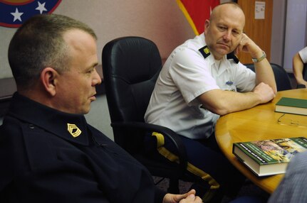 Command Sgt. Maj. Brunk Conley listens to the discussion regarding a book that he and several other Guard members are reading at the Army National Guard Readiness Center in Arlington, Va., March 29, 2013. In addition to a book club, Conley also recently taught sessions at the Readiness Center to highlight a new initiative.