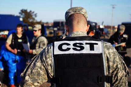 Civil support teams have been busy this week as events unfolded in the U.S. In this 2008 image, 1st Lt. Craig Geise, a medical team member from Madison, Wis., assigned to the 54th Civil Support Team, a National Guard unit from Madison, Wis., listens to a briefing during training.