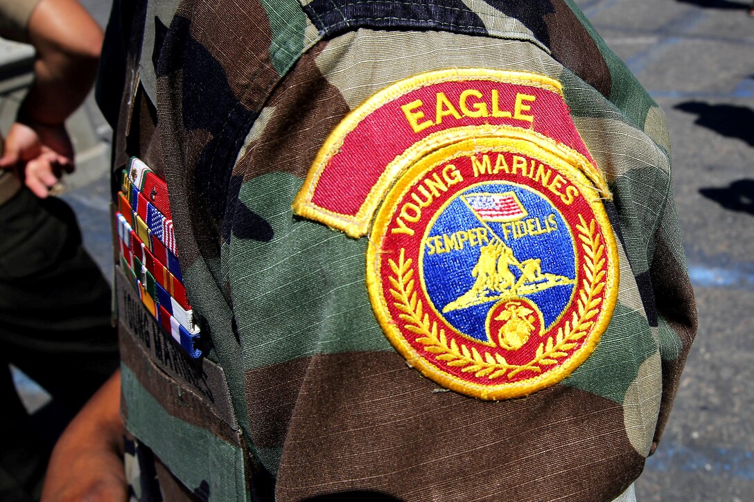 Each Young Marine in the Eagle Young Marine program wears shoulder patches that designate their unit and ribbons to display their achievements in the program. The Eagle Young Marines of the Marine Corps League is a non-profit youth organization dedicated to drug demand reduction, academics, and community service.