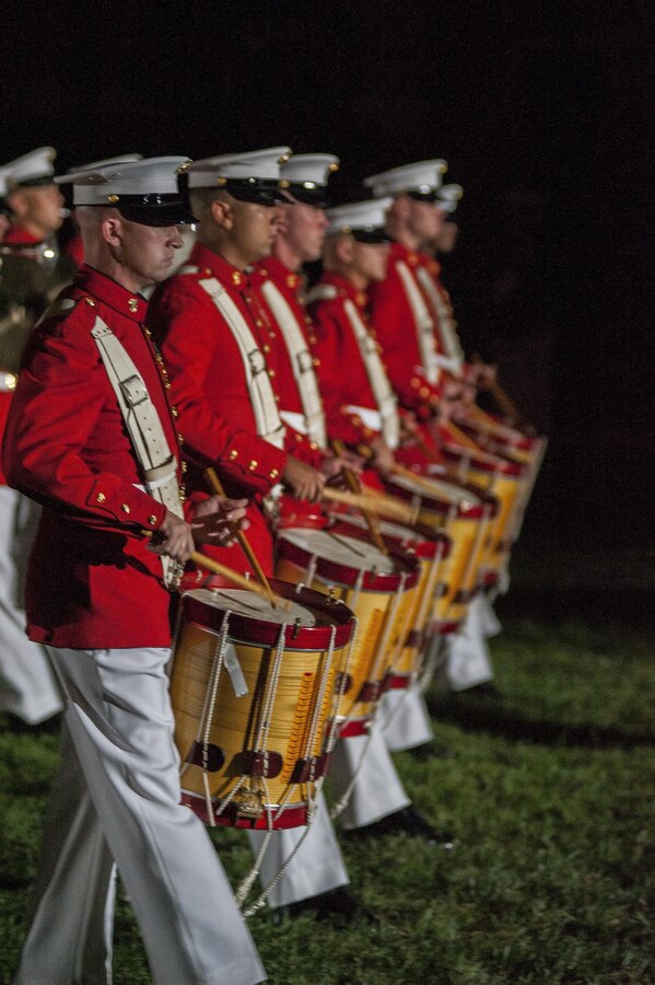 The U.S. Marine Drum and Bugle Corps performs during a Friday Evening Parade at Marine Barracks Washington, D.C., August 9. 