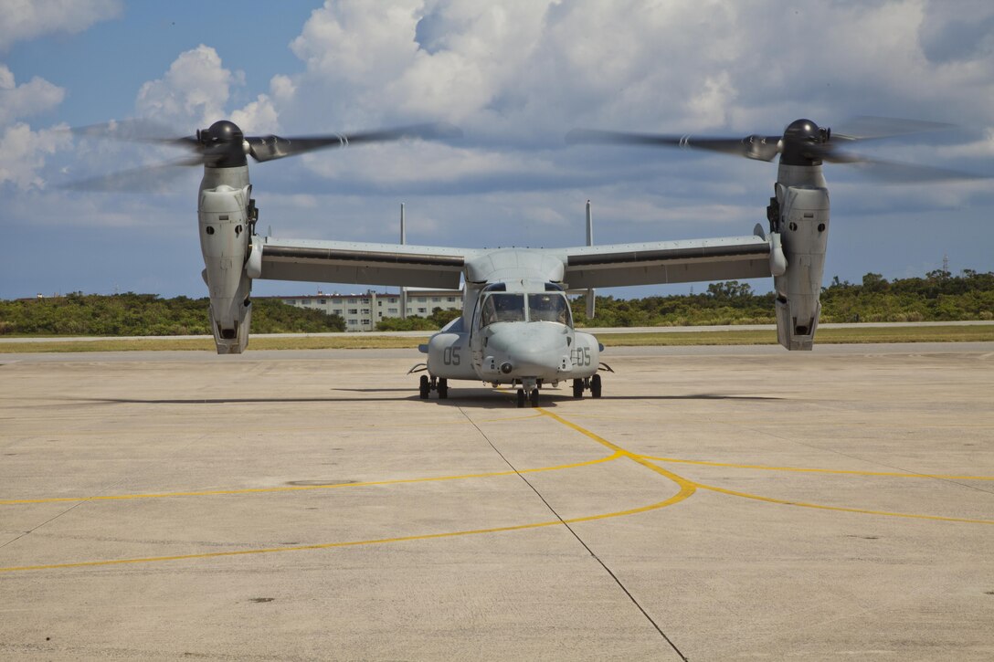 An MV-22B Osprey taxis after landing at Marine Corps Air Station Futenma Aug. 12. The Marine Corps is modernizing its fleet with MV-22 tiltrotor aircraft and removing the remaining CH-46E helicopters from service with one-for-one swaps. The Ospreys can fly twice as fast, carry three times as much and fly four times the distance of the older CH-46E helicopter it is replacing. The Osprey is with Marine Medium Helicopter Squadron 262, Marine Aircraft Group 36, 1st Marine Aircraft Wing, III Marine Expeditionary Force. (U.S. Marine Corps photo by Lance Cpl. Stephen Himes)