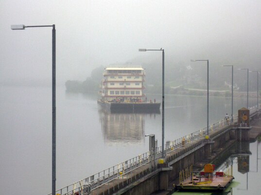 Motor Vessel MISSISSIPPI emerges from the early morning fog as she approaches Lock and Dam 6 in Trempeleau, Wis. Motor Vessel MISSISSIPPI emerges from the early morning fog as she approachs Lock and Dam 6 in Trempeleau, Wis. The largest diesel towboat on the Mississippi River was on the Upper Mississippi River as part of the Mississippi River Commission's Low Water Inspection trip. A public hearing was hosted by the Mississippi River Commission and Corps of Engineers onboard the Motor Vessel MISSISSIPPI at Riverside Park Landing in La Crosse, Wis., August 12, 2013.